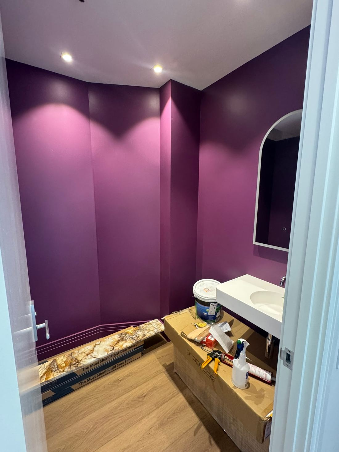 Powder room in deep plum
