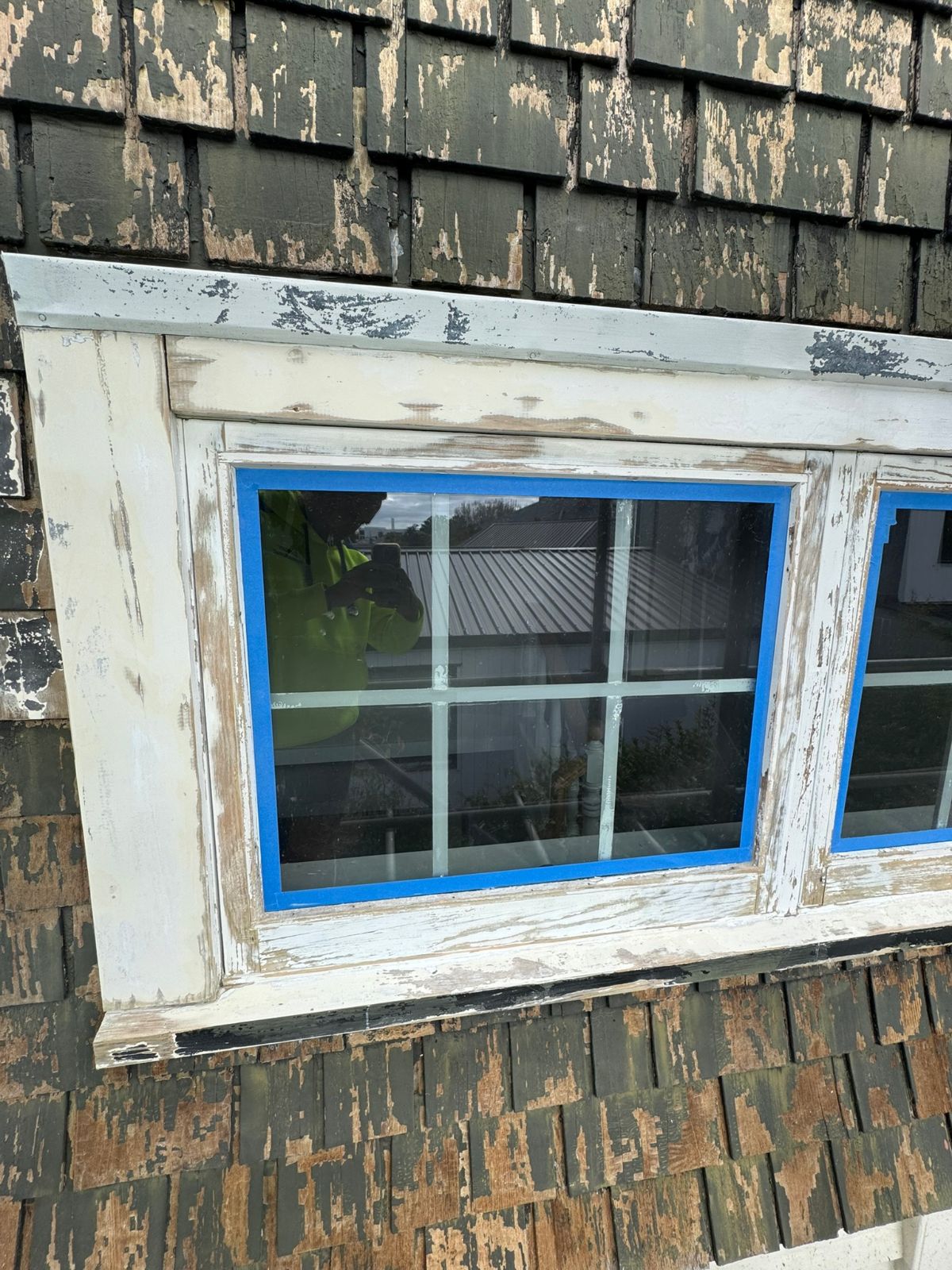 Heritage shingle and window before restoration